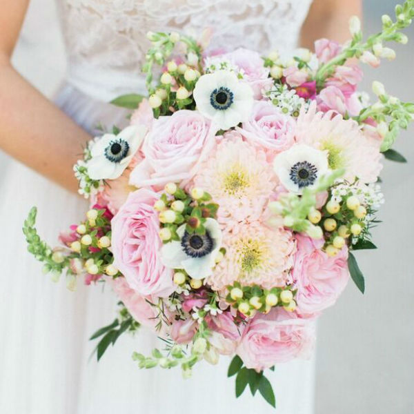 Blush and ivory bridal bouquet with anemones and garden roses